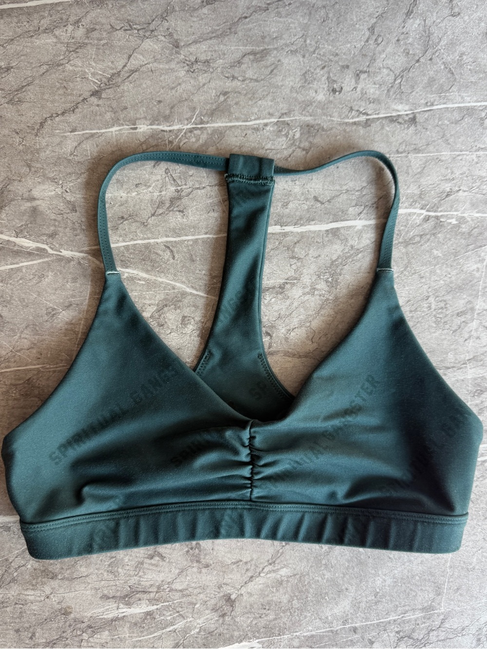 Spiritual gangster teal gathered v neck sports bra
